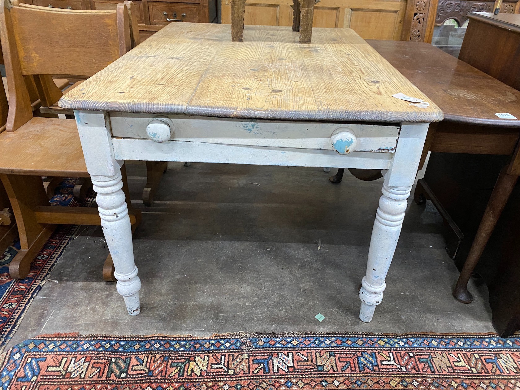 A Victorian pine and later painted kitchen table, with frieze drawer, width 122cm depth 87cm